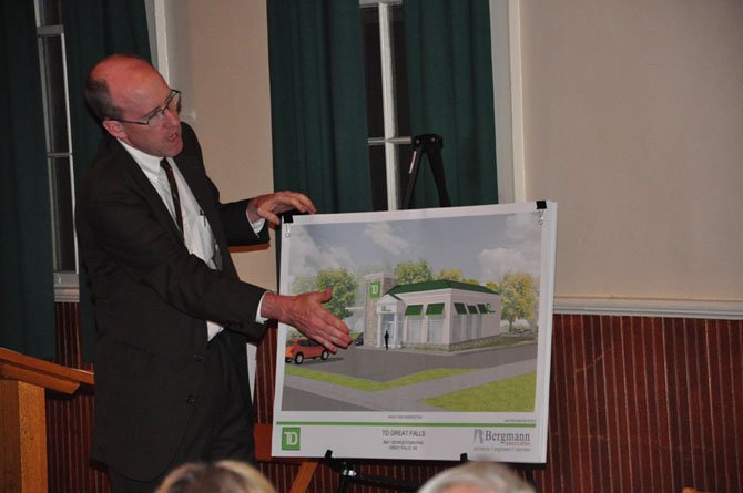 Sean O’Rourke, an architect with Bergmann Associates, shares his design for a proposed TD Bank in Great Falls at the Grange Tuesday, Sept. 27. 