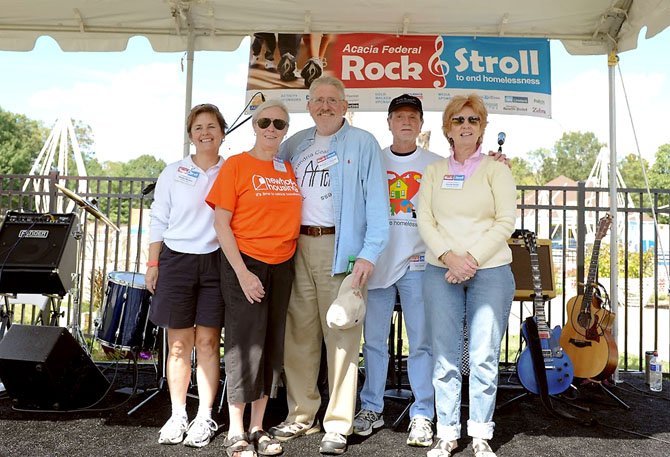 Nonprofit executive directors gather for a photo at the Rock and Stroll walk to end homelessness. From left: Shelley Murphy, Wesley Housing; Pamela Michell, New Hope Housing; Michael O'Rourke, AACH; Ken Naser, ALIVE!; and Bonnie Baxley, Community Lodgings.
