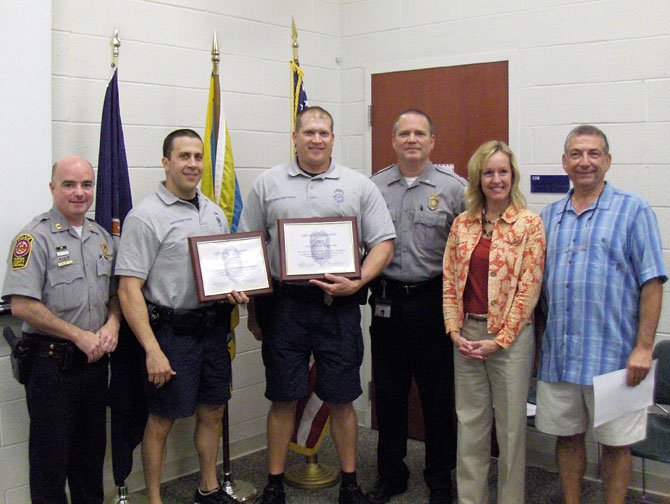 From left are Capt. Ed O’Carroll, MPO Garrett Polowy, PFC Adam Jantosciak, Lt. John Trace, and Leslie Jenuleson and Steve Pollard of the CAC.  
