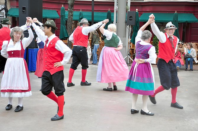 Members of the Alpine Dancers, an ensemble specializing in dance from Austria, Germany and Switzerland, perform at the Reston Oktoberfest Sunday, Oct. 7. 
