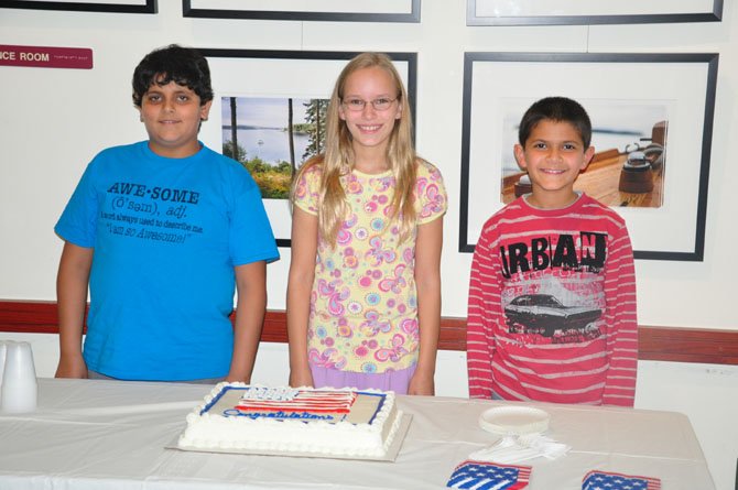 From left, Kavye Vij, Maren Kranking and Sherwin Momenian, participants in the second annual Friends of the Great Falls Freedom Memorial essay contest at the Great Falls Library, Saturday, Oct. 6. 