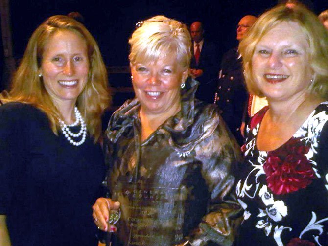 Lizzy Conroy, Marcia S. Twomey (Greater McLean Chamber of Commerce president) and Karen Briscoe at the award ceremony.