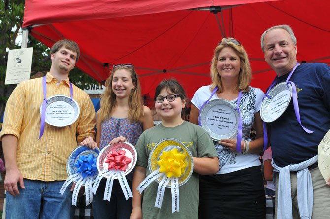 Pie contest judges Ben Snyder (the baker at The Happy Tart), Bobi Bomar (Homes of Alexandria) and Sheriff Dana Lawhorne pose for a picture with the Kaia Johnson and Reagan Sofeld. Kaia won first and second place in the kid’s division. Reagan’s pie came in third. Adult winners included Randy Hilton, Nancy McKenna and Katie Morse.
