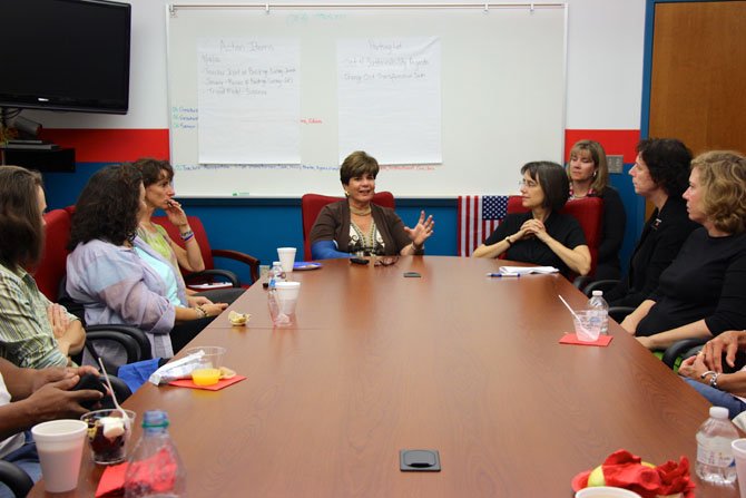 Principal Suzanne Maxey talks to parents during a principal's chat.  
