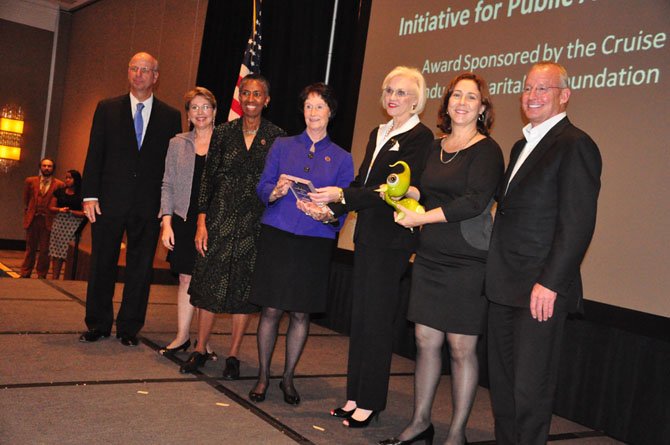 Members of the Initiative for Public Art-Reston are given the Arts Impact Award at the Arts Council of Fairfax County awards luncheon Friday, Oct. 12. 