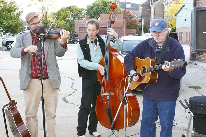 The Randy Barrett trio entertains the crowd at the Alexandria Seaport Foundation's second annual Riverfest.
