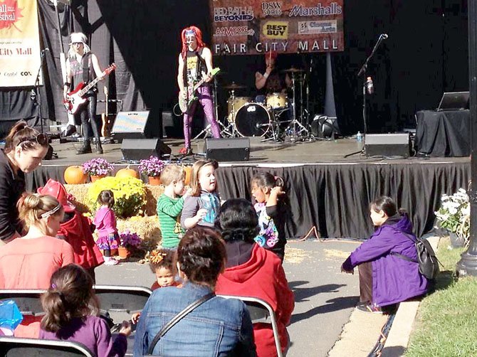 Girlz, Girlz, Girlz—Girls, big and small, rocked out with the pop cover band on the Main Stage during the city’s 36th annual Fall Festival on Saturday, Oct. 13.