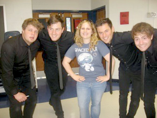 West Springfield High School junior Diana Schulberg with the band ARTIG. (From left) Dave, Chris, Max and Martin.
