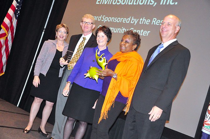 Employees of EnviroSolutions receive the Arts Philanthropy Award for their contributions to the Workhouse Arts Center in Lorton. They were given the award by the Arts Council of Fairfax County at their awards luncheon Friday, Oct. 12. 
