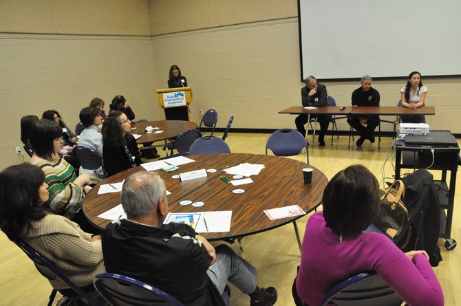 Dr. Tilman Jolly, an emergency physician at INOVA Fairfax, Sgt. James Cox, supervisor of the Special Investigations Narcotics Squad and Money Laundering units for the Fairfax County Police Department and Van Huynh, head of the pharmacy department at the McLean CVS, speak at the McLean Community Center about the dangers of prescription drug abuse Wednesday, Oct. 17.