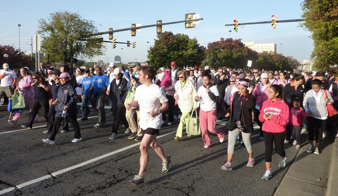 More than 900 people line up on Eisenhower Avenue Oct. 20 to begin the 2012 Walk to Fight Breast Cancer.
