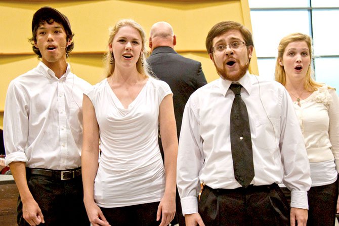 (From left) Rafael Medina as Jack, Alexandra Pool as Red Riding Hood, Kyle Imperatore as The Baker and Kate Merryman as Cinderella in “Into the Woods.”