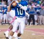 Churchill quarterback Jonathan Lee prepares to throw against ...