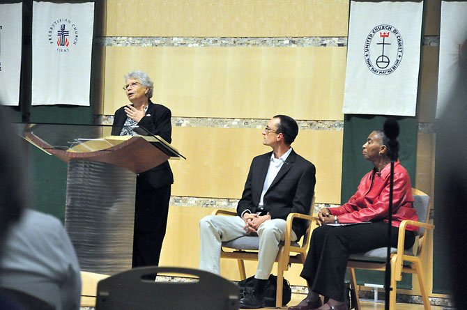 Sister Marge Clark, a nun who has traveled the United States discussing the place of social issues in public budgeting, speaks at the United Christian Parish in Reston Thursday, Oct. 25. 