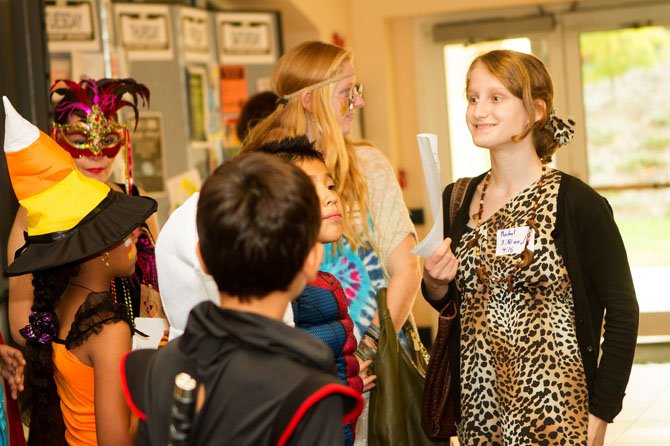 Marymount University students take local children on a trick-or-treating tour around the Arlington campus during the school’s 16th annual HalloweenFest.