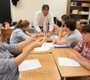 Teacher John McMillen leads a math class at ...