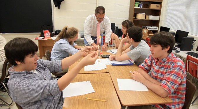 Teacher John McMillen leads a math class at St. Andrew's Episcopal School in Potomac. The school was recognized recently for its innovative approach to teaching students.
