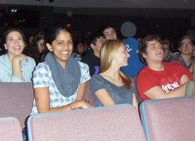 Roshni Gorur (in scarf) enjoys a laugh with classmates at the program’s end.
