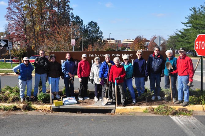 Members of the Reston Garden Club during their “Big Dig” beautification project at the Reston Regional Library Monday, Nov. 5. 