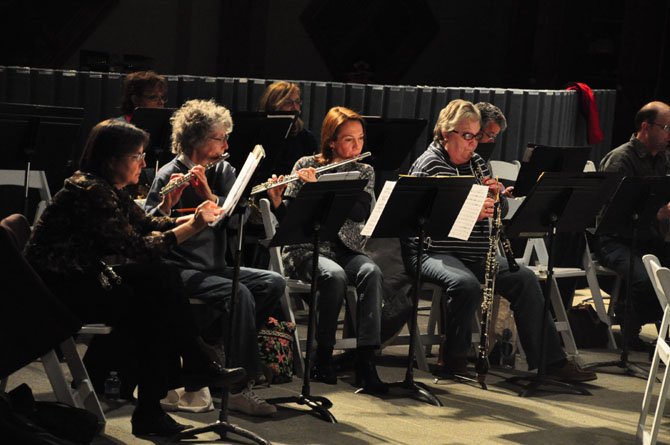 Members of the Reston Community Orchestra rehearse in preparation of their 25th season at the Sunset Hills Montessori School.