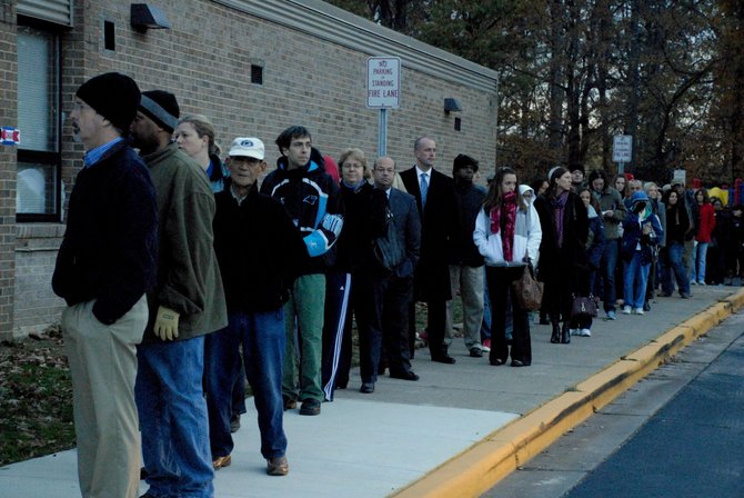 Voters lined up outside Lake Anne Elementary early Tuesday morning for last year’s election. Voters reported about a 45-minute wait at Lake Anne Elementary.