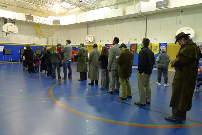 People wait to vote at Barcroft polling place at 8 a.m.  
