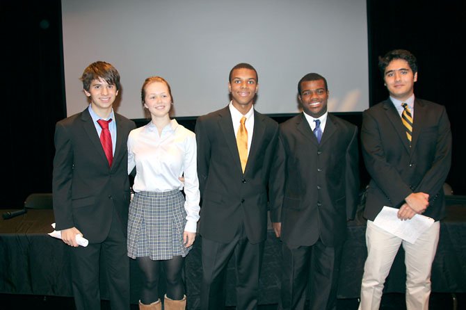 The candidates and moderator, from left: Teddy Sullivan '15 as Mitt Romney; Sioned Vaughan '14 as Jill Stein (Green Party); Zach Wood '14, moderator; JD Dyer '13 as Barack Obama; Arman Salmasi '15 as Gary Johnson (Libertarian Party).