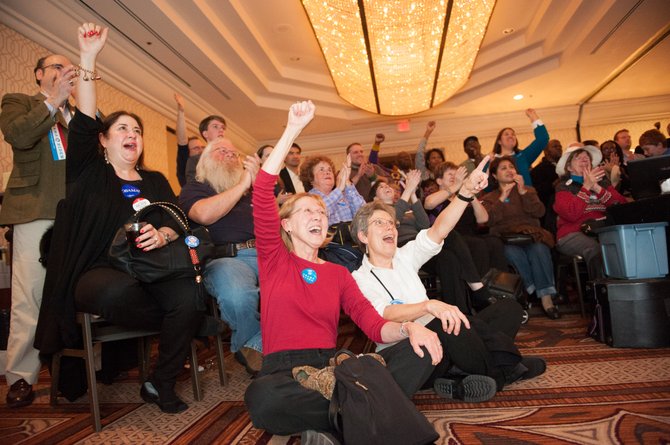 Reaction to the announcement that President Barak Obama has been reelected at the Fairfax County Democrats Victory Party on Nov. 6.