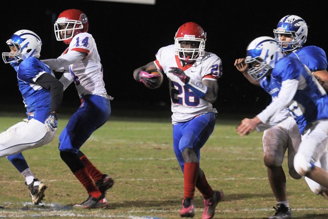 T.C. Williams running back Dealo Robertson rushed for 131 yards and a touchdown against West Potomac on Nov. 2.