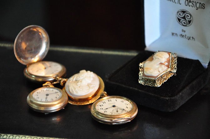 A selection of antique pins and pocket watches at Thieves Market in McLean. 