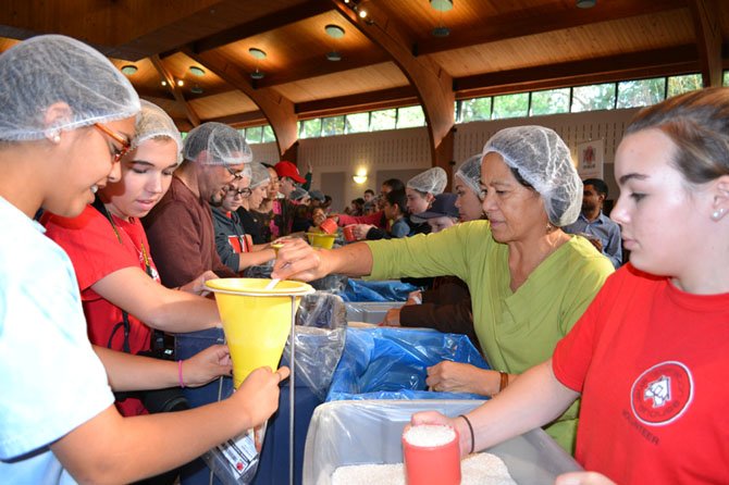 Volunteers measured and weighed each pre-packaged meal for consistency.