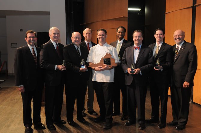 2012 Alexandria Chamber of Commerce Business Award recipients posed for a photo after the presentation on Monday night at the Schlesinger Center with Chamber Chairman Andrew Palmieri and Chamber President John Long. The awardees are, from left, Roger Parks of American Advertising Distributors of Northern Virginia for Small Business of the Year, Executive Director John Porter and Chair of the Board Gene Steuerle of the Alexandria Community Trust for Association/Non-profit of the Year, Business Leader of the Year Cathal Armstrong, Anthony Pryor of Marstel-Day LLC for Environmentally Friendly Business of the Year, Robert Shea of Grant Thornton LLP for Overall Business of the Year  and Philip Honaker Commonwealth One Federal Credit Union and Philip Honaker for Medium Business of the Year.
