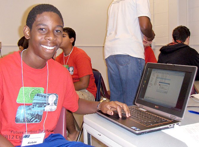 Paul VI High senior Kelvin Simmons at his computer during class.