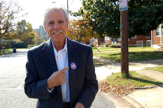 Pablo Rodriguez pointed at the "I Voted" button on his chest. 
