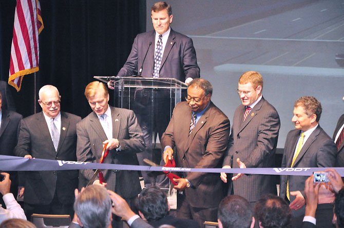 Gov. Robert McDonnell cuts the ribbon on the 495 Express Lanes Tuesday, Nov. 13 at the Sheraton Tysons. 