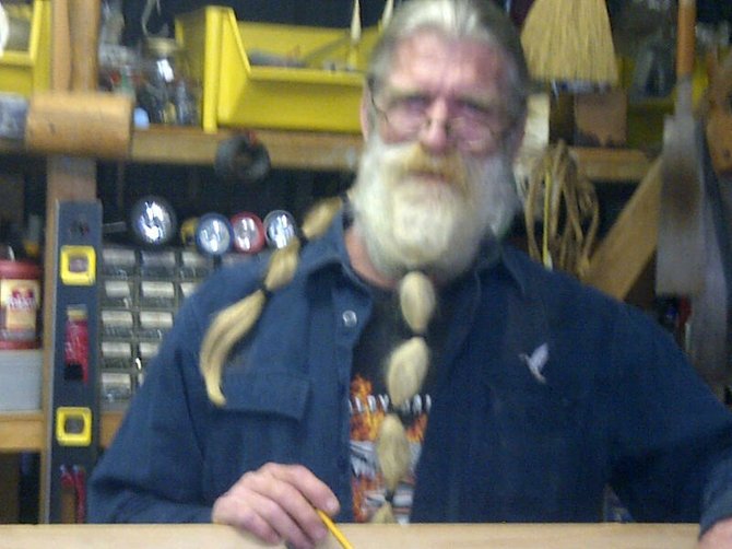 Joe Reasoner, woodcrafter of the Ride-n-Rocker, on display, at Grandmother's Back Room.