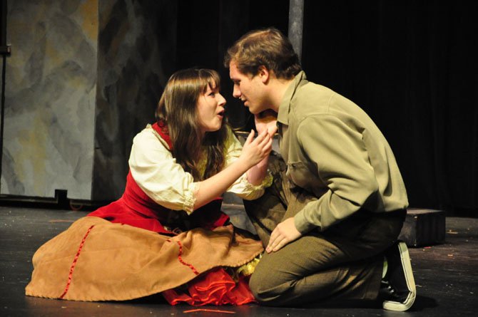 Fiona (played by Molly Nuss) and Tommy (played by Paul Morgan) struggle with their feelings for each other during a scene in Herndon High School’s production of "Brigadoon."