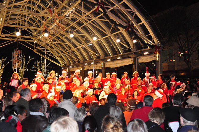 Members of the Reston Chorale perform at the annual tree lighting ceremony at Reston Town Center Friday, Nov. 23. 