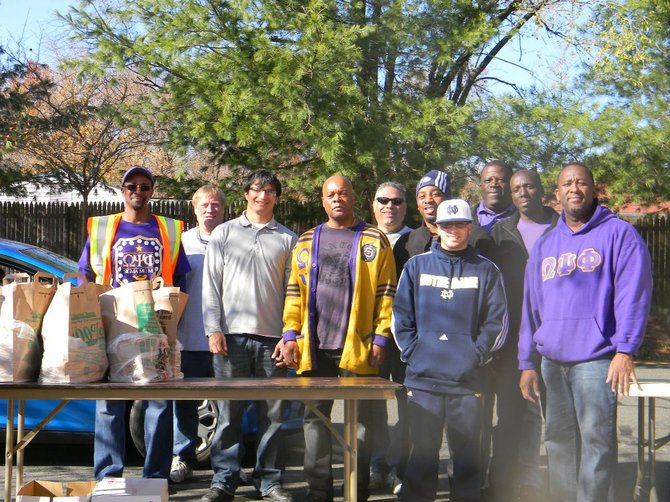 Men from Fairfax and Loudoun volunteered together and managed the constant traffic of shopping carts as 50,000 pounds of non-perishable groceries were loaded into vehicles of families in need from Sterling, Ashburn and Herndon. Christ the Redeemer Catholic processed 55 families an hour, totaling 397 carts between 8 a.m. and 3 p.m. Working in parallel, Trinity Presbyterian in Herndon handled 404 grocery carts. Seventy-three walk-in families were served at the end of the day. 