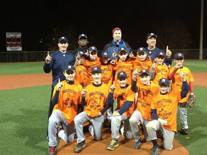 Front row: Ethan Lipp, Brendan Sweeney, L.A. Rice, Cade Kettner, Aiden Soule; Middle Row: Korey Sharpe, Henry Freck, Dylan Ford, Jacob Kohls, Luke Williams, Mark Prillaman, Brad Tunks; Back Row: Coach John Freck, Coach Darren Sharpe, Coach Chris Lipp, Coach Roger Williams.