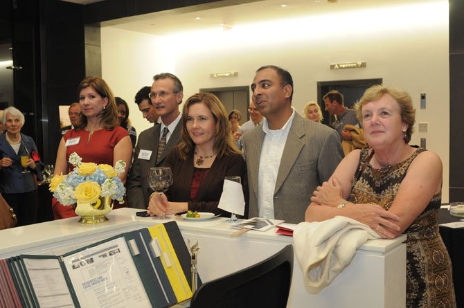 Guests take places in the United Way Worldwide Headquarters lobby for the presentation of the 1st National Spirit Award and raffle drawings.