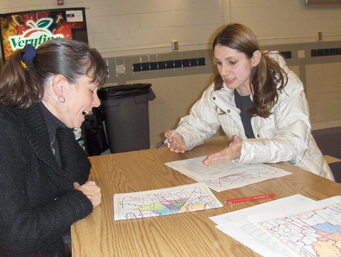 (From left) Parents Tina Steblein and Reem Akkad talk about potential effects of the boundary changes.