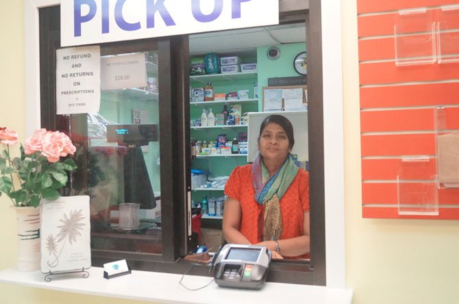 Kamini Shah greets customers at the pick-up desk and said she enjoys interacting and developing relationships with them.