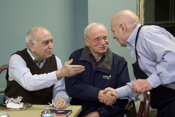 Every other month at Hunter’s Woods Fellowship House in Reston, residents attend an International Tea and share dishes from their country of origin, with one such function pictured here. At Hunter’s Woods Fellowship House, 50 percent of the residents are Asian, 21 percent are from Middle Eastern countries and the remainder are Russian, Caucasian and Hispanic.