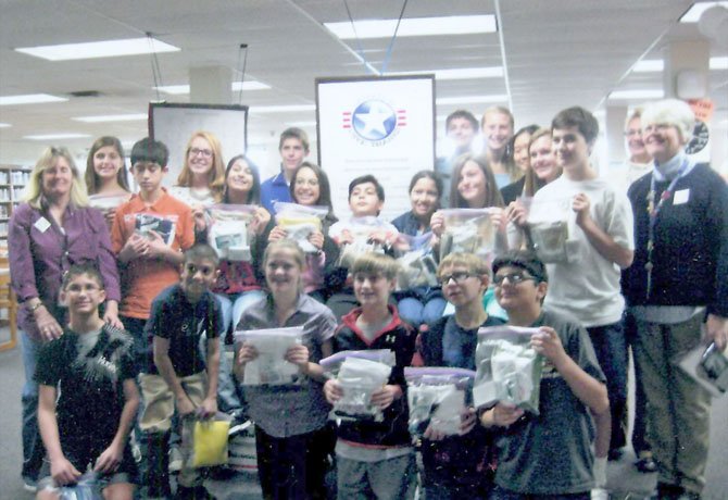 On Nov. 20, Cooper Middle School students packaged hundreds of Hygiene Kits for Hurricane Sandy relief efforts.
