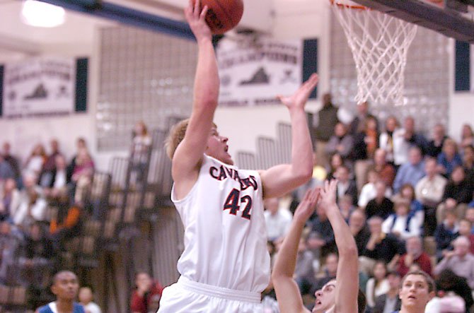 Woodson junior Andy Stynchula can make an impact in the paint or around the perimeter.