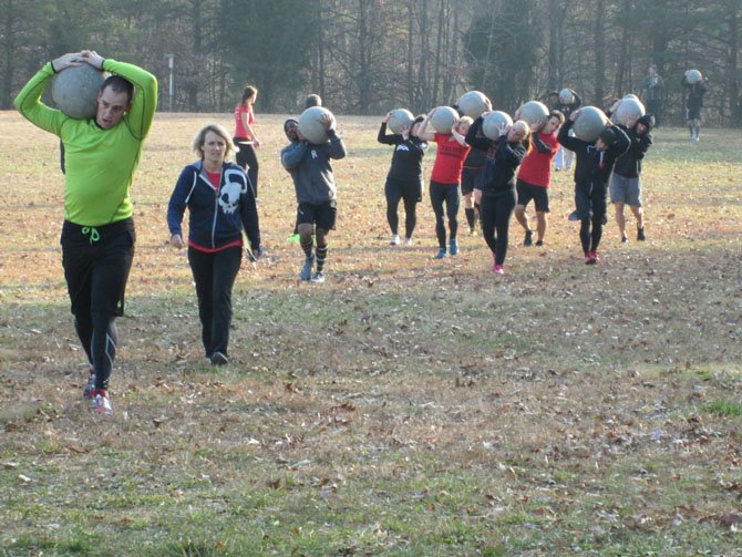 During Saturday afternoon’s event, teams were required to complete an 800 meter run which included such obstacles as picking up and carrying 95-145 lb. Atlas stones for 200 meters.