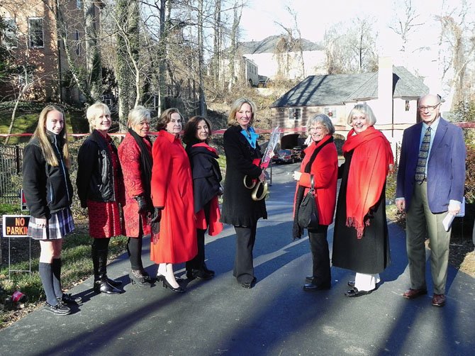 Pictured, from left, Diana Simione, a student from McLean’s Oakcrest School, who assisted in the tour; Woman’s Club member Cathy Kelly, McLean Chamber of Commerce Chairman Marcia Twomey, tour Co-Chairman Rosemarie Lazo, tour homeowner Bushra Sangid, Del. Comstock, tour Chairman Kathlyn Burnell, Woman’s Club President Virginia Sandahl and Roger Kilton, a homes tour visitor and supporter.