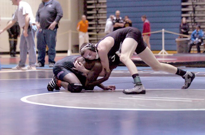 South County’s Hunter Manley won the 120-pound title at the 2012 FinalAutoPrice.com NOVA Classic on Dec. 8 at Fairfax High School.