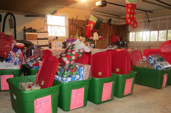 Bins filled the garage with the names of the shelter and families posted on the front.